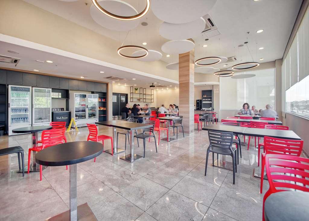 Hus Hotel 두라도스 레스토랑 사진